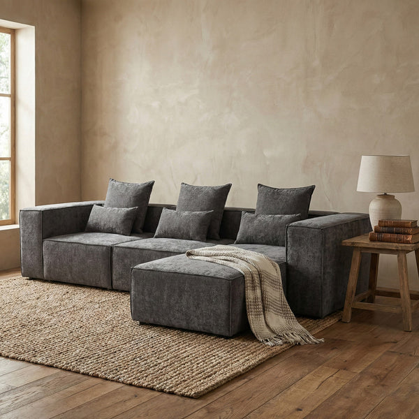 Divano angolare in tessuto grigio scuro 323x118-205x68 cm - Deluxe